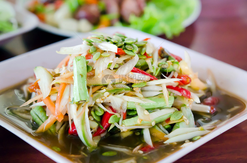 索姆塔姆香料盘子绿色蔬菜沙拉营养美食食物木瓜图片