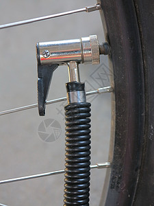 自行车充气阀门自行车压强压力通货膨胀服务损害手套情况配件车轮维修充气背景
