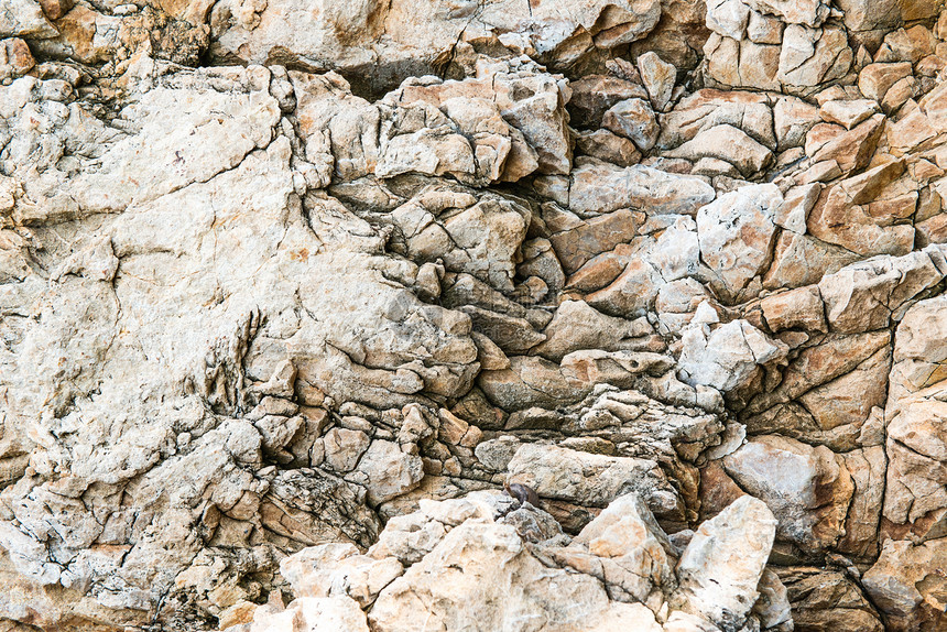 固体石灰岩质状体 有柔滑裂缝棕色金子墙纸大理石灰色材料建造石头艺术帆布图片