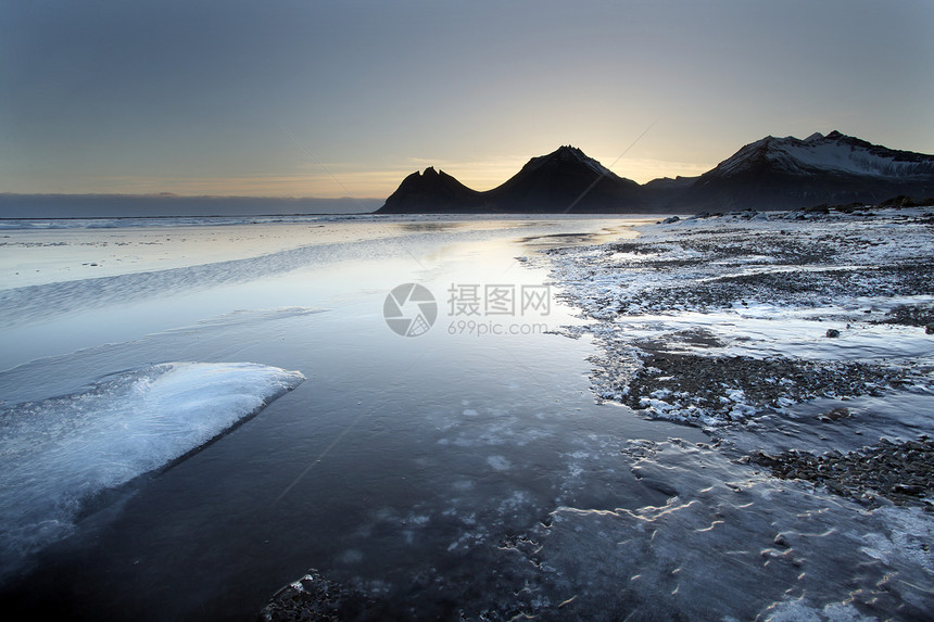 冰岛冷冻海岸环境海滩假期天空蓝色风景海洋海岸线地平线日落图片
