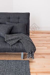 藤编坐垫蒲团灰色沙发 有坐垫和扔背景