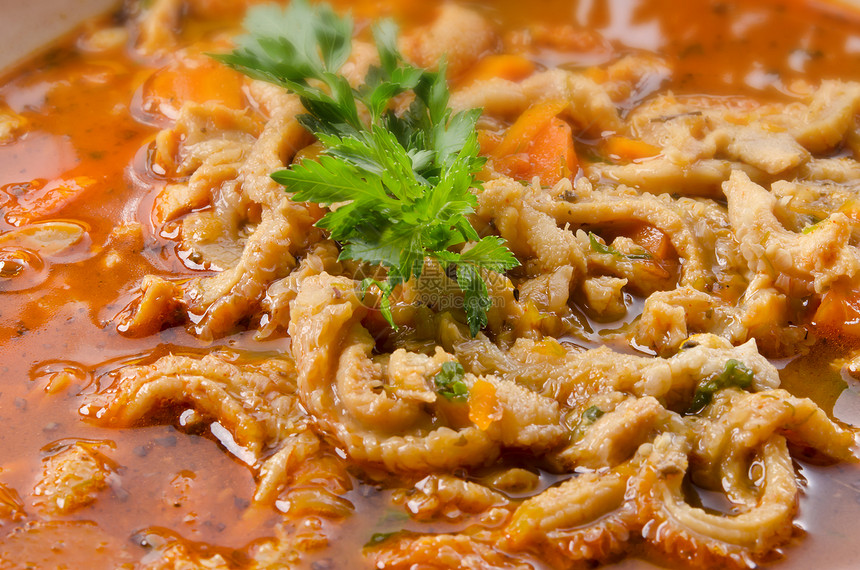 波兰传统牛肚汤餐厅薄片养牛盘子香菜猪肉饮食美味食物蔬菜图片