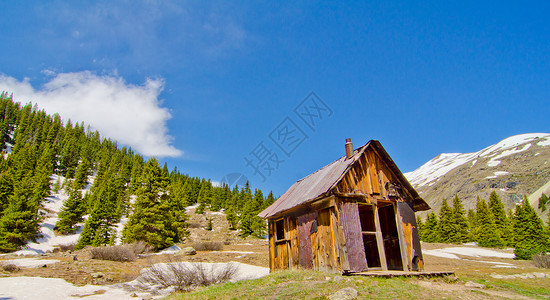 工程师准证科罗拉多圣胡安山鬼城的一座保留房屋工程师天空旅游旅行鬼城冒险山脉肉桂动物叉子背景