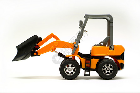 小小挖掘器玩具轮子车辆机器机械工作建筑构造装载机黄色背景图片