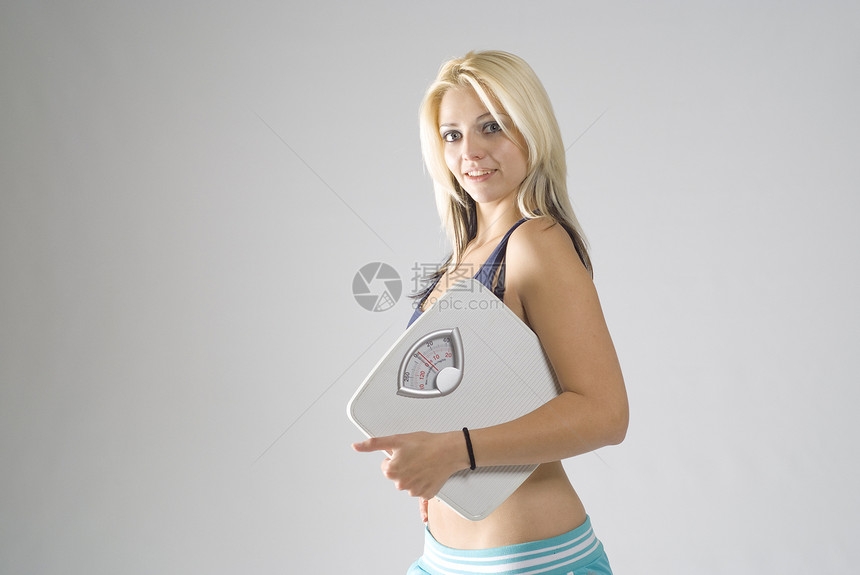 使年轻女性对目标饮食体重感到快乐图片