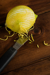 去皮刀冻柠檬皮肤热情工具美食黄色果皮营养食物刮胡子用具背景