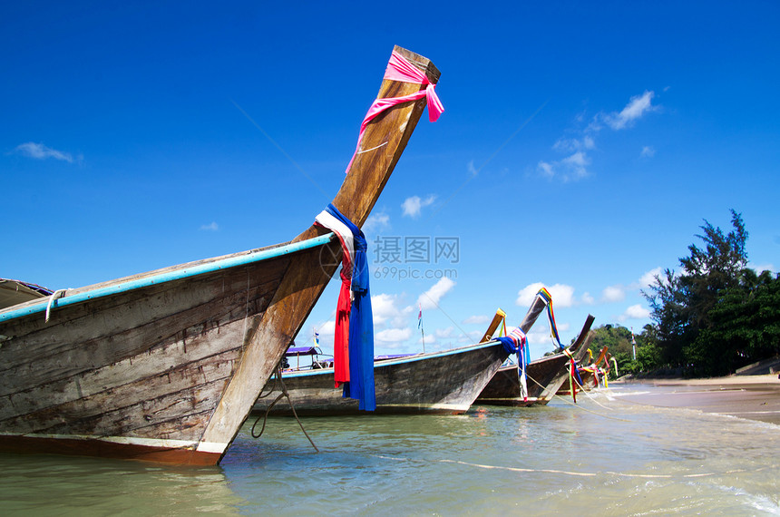 热带热带海滩运输假期尾巴蓝色旅游海景旅行岩石海岸血管图片