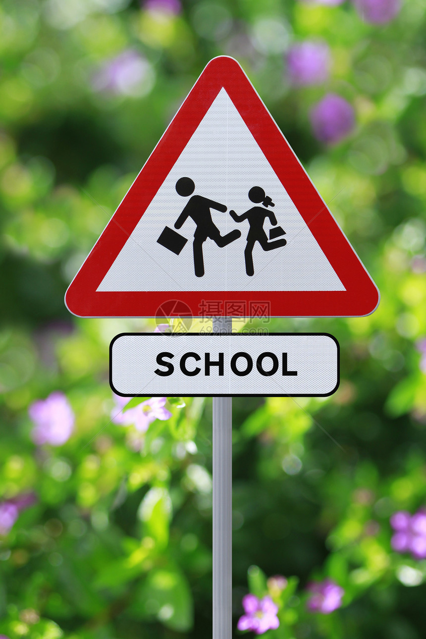 学校区小学生警告标志安全白色绿色指示牌女学生孩子们减速图片