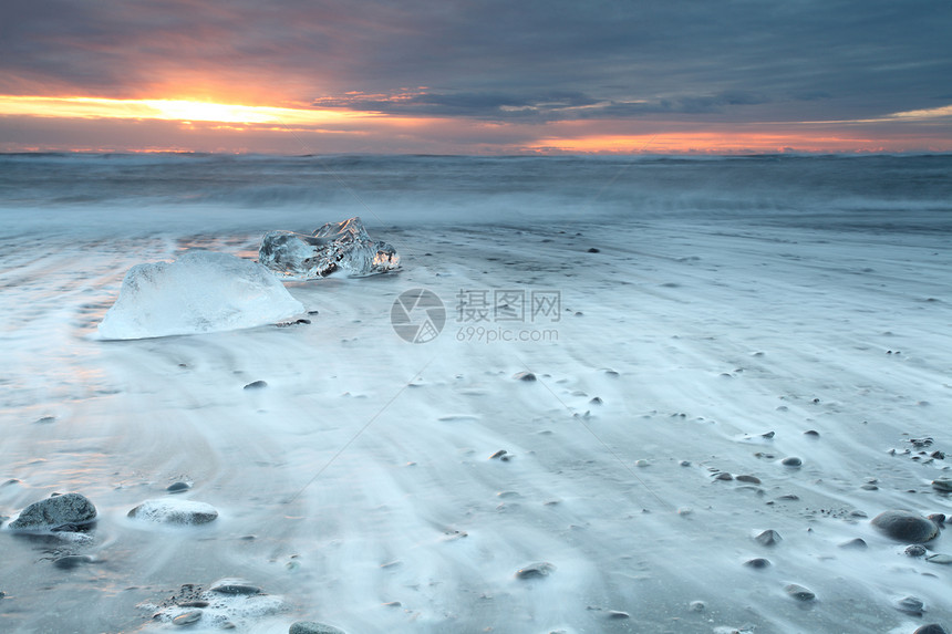 冰堡海滩支撑天空阳光日落漂流海景冻结运动风景蓝色图片