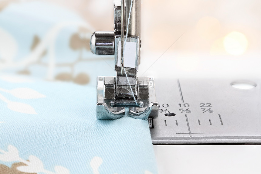 缝合机针和织物图片