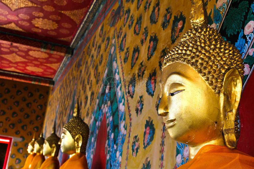 曼谷泰国Wat Arun的佛像青铜智慧金子文化雕塑橙子寺庙上帝眼睛宏观图片