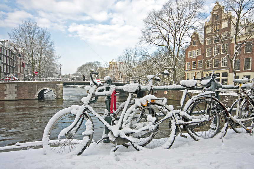 荷兰阿姆斯特丹市的雪雪特丹自行车建筑学运输建筑房子风光城市图片