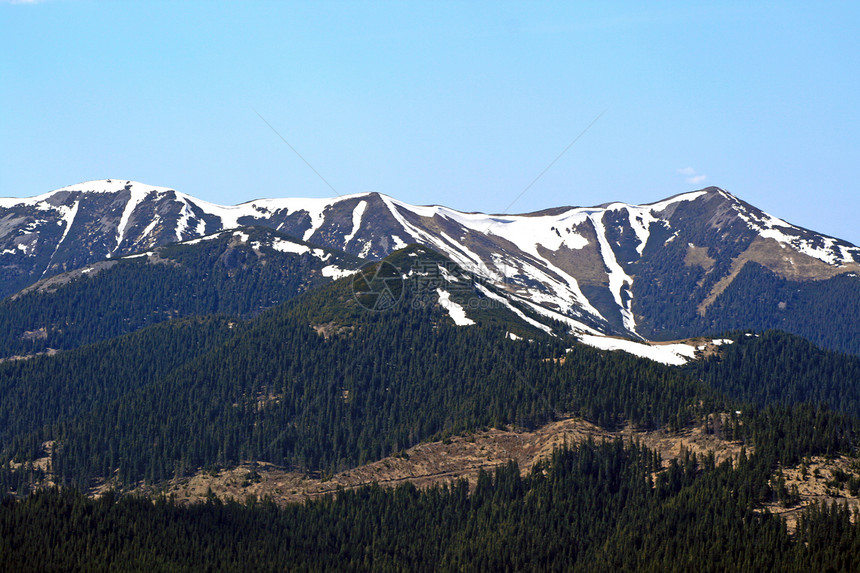 雪山脊顶峰全景崎岖远足阳光岩石太阳山峰丘陵山脉图片