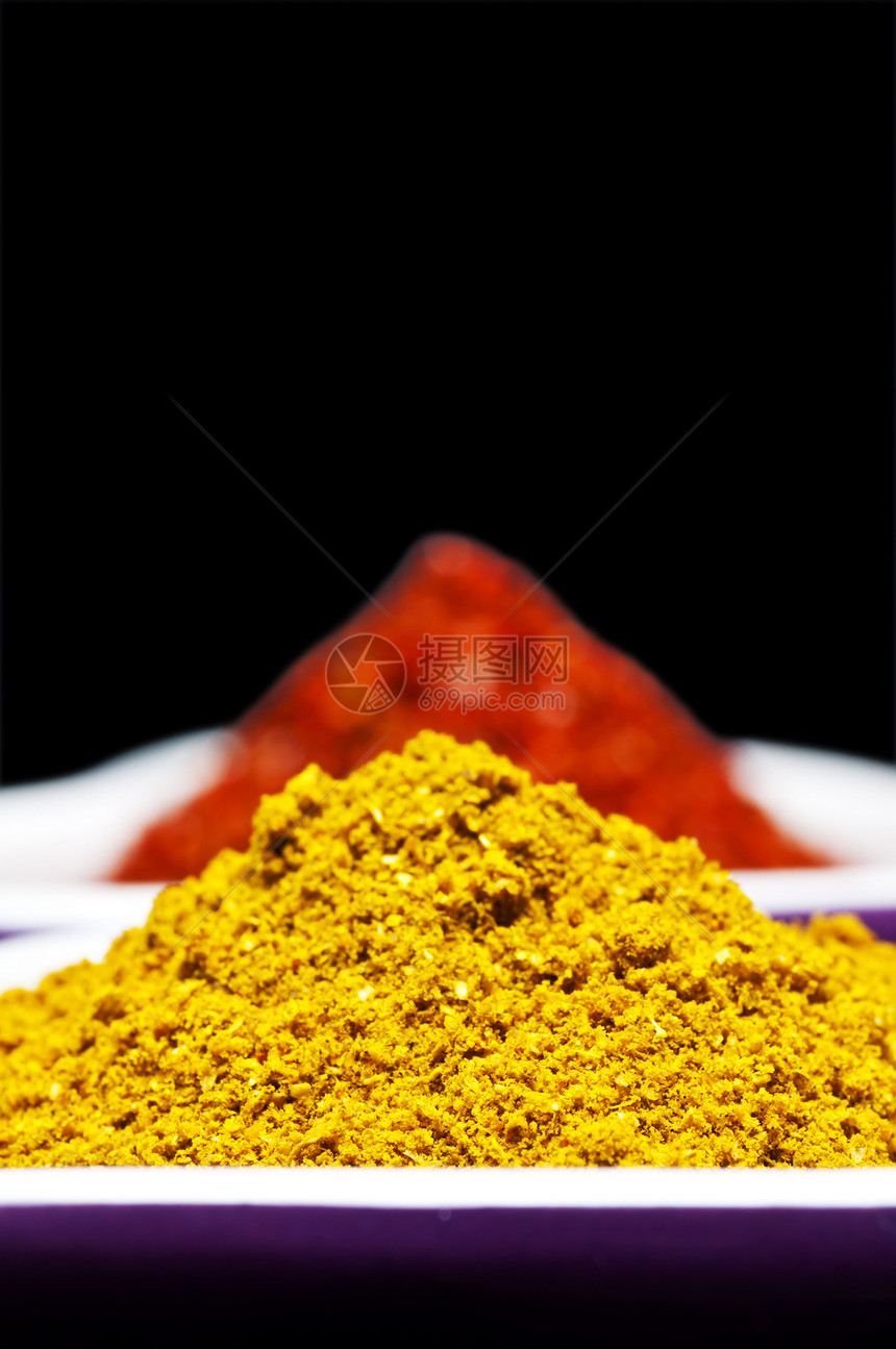 美食 卷曲萝卜黑色黄色粉末辣椒宏观食物烹饪味道药品自然图片
