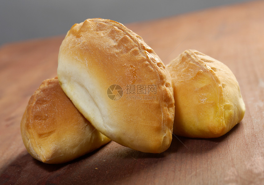 与果酱对抗的家蛋糕木头糊状面包甜点饺子小吃传统馅饼馒头食物图片
