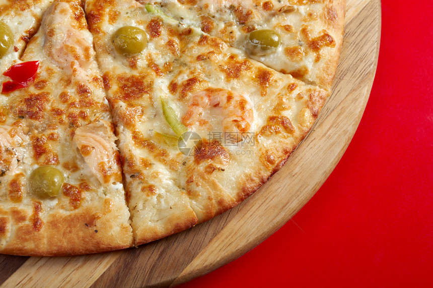 披萨和鲑鱼餐厅蔬菜胡椒脆皮育肥午餐柠檬食物圆圈小吃图片