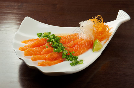 沙门塞西米鱼片熏制盘子海鲜香料鲷鱼食物拼盘背景图片