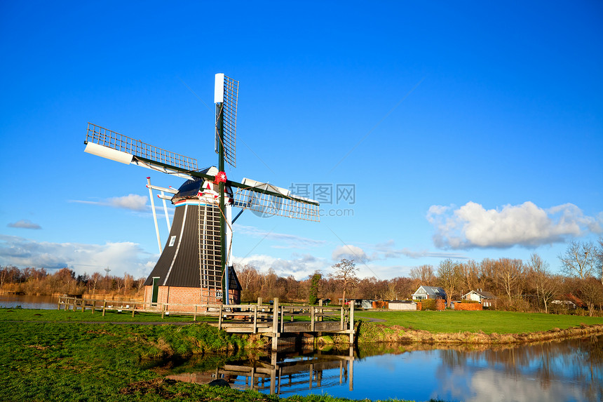 迷人的荷兰风车建筑学场地旅行农家历史晴天草地吸引力阳光农村图片