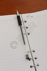 打开的笔记本教育空白写作床单记事本笔记备忘录白色传单文件夹背景图片