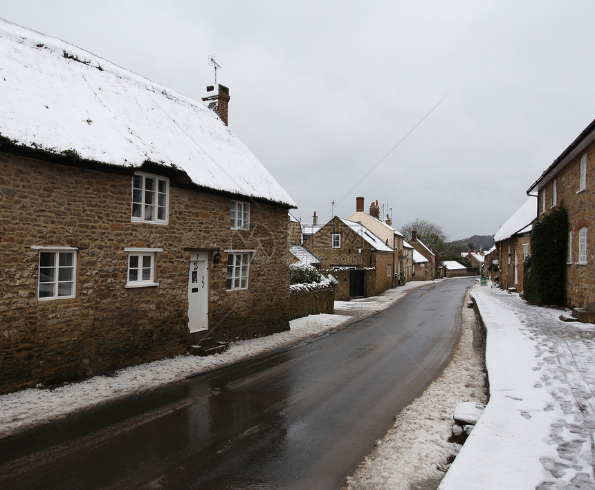 冬季雪雪历史茅草房子乡村小屋芦苇村庄建筑学白色英语图片