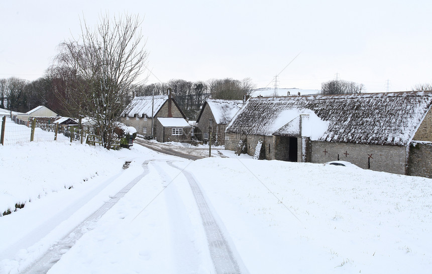 冬季雪雪村庄白色历史芦苇英语茅草建筑学乡村房子小屋图片