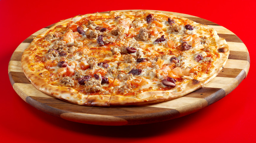 Neapolitan比萨食物小吃牛肉碎肉午餐圆形育肥圆圈脆皮餐厅图片