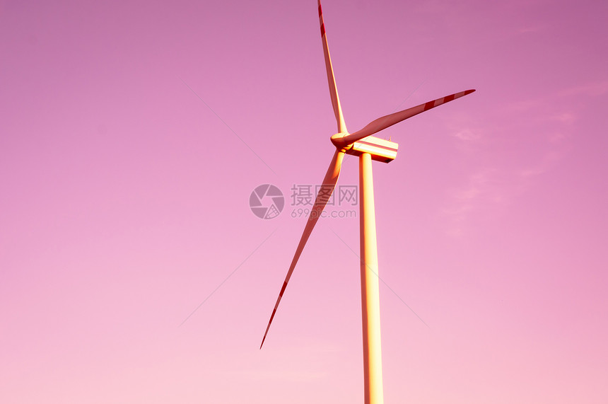 黄昏时的风涡轮照片日落涡轮机产业环境水平风车太阳摄影彩色图片