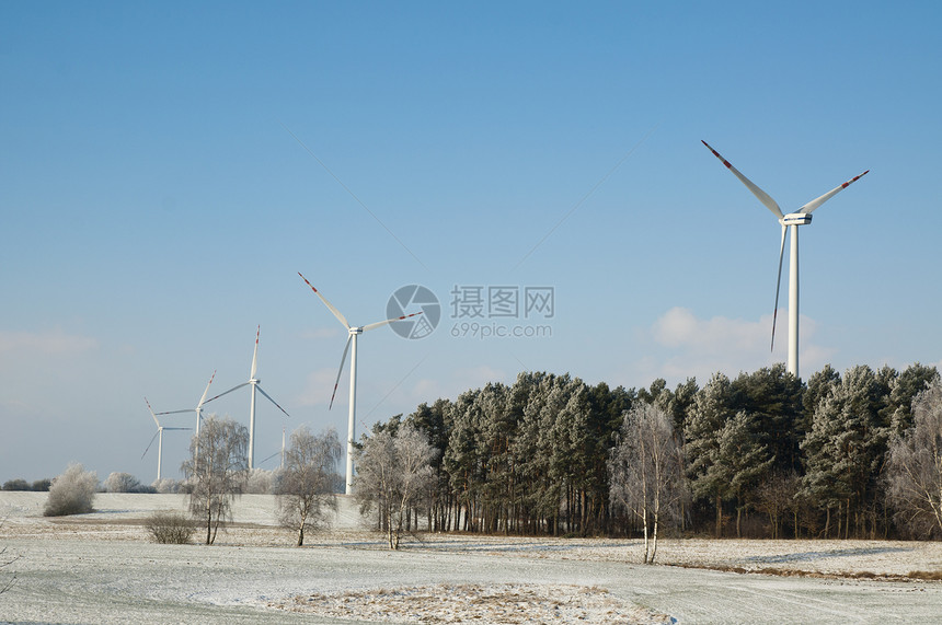 冬季风景涡轮机环境天气冻结阳光风车蓝色反射场地天空图片