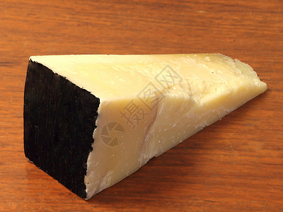奶酪零食牛奶食物木头黑色背景图片