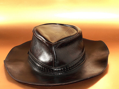 顶帽子墙纸皮革金子棕色工艺牛仔背景图片