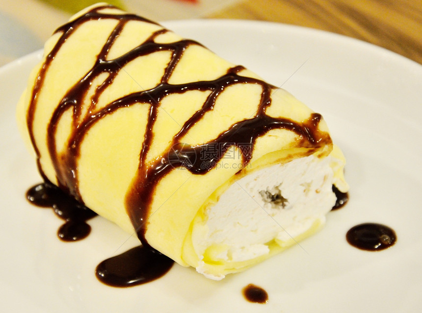 软卷饼和巧克力酱咖啡时间时光休闲盘子食物甜点餐厅巧克力奶油状图片