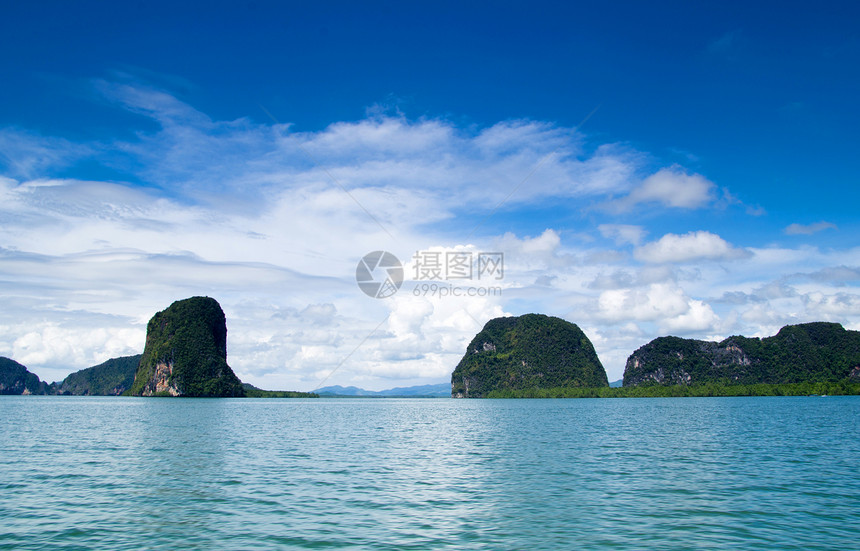 热带岛屿地貌天空支撑旅游晴天岩石娱乐风景海洋假期天堂图片