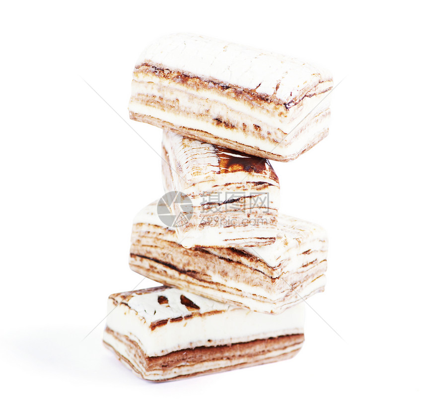 白色堆在一起的几块诺阿特巧克力可可棕色小吃诱惑团体礼物美食核桃黑色图片