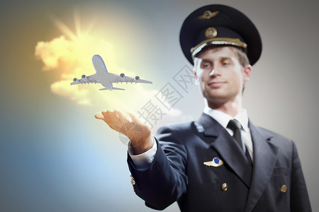 手持飞机的飞行员图像游客速度旅行太阳飞人引擎航展成人涡轮男人背景图片