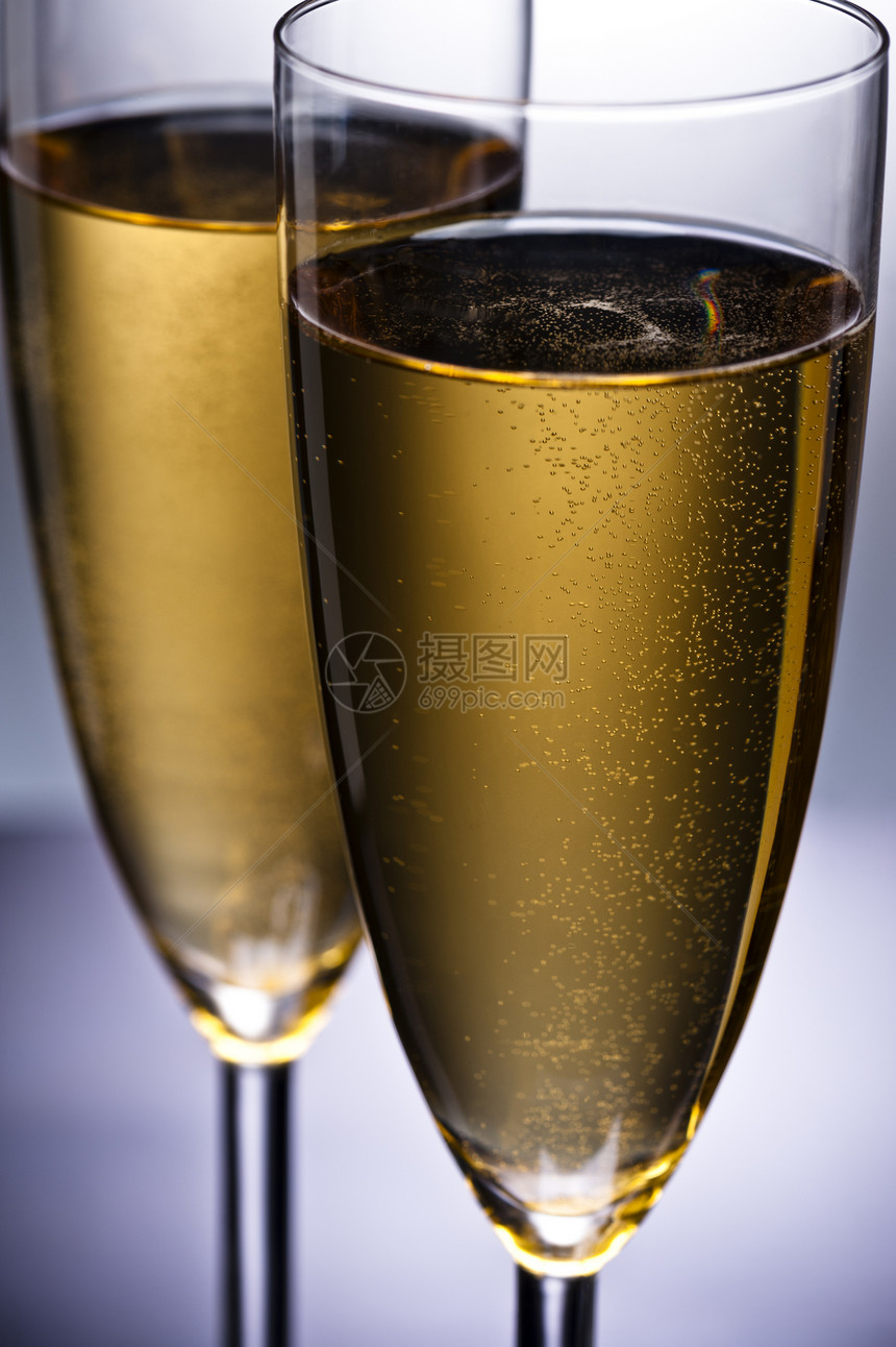 香槟杯饮料玻璃香槟黄色辉光长笛派对火花金子魅力图片