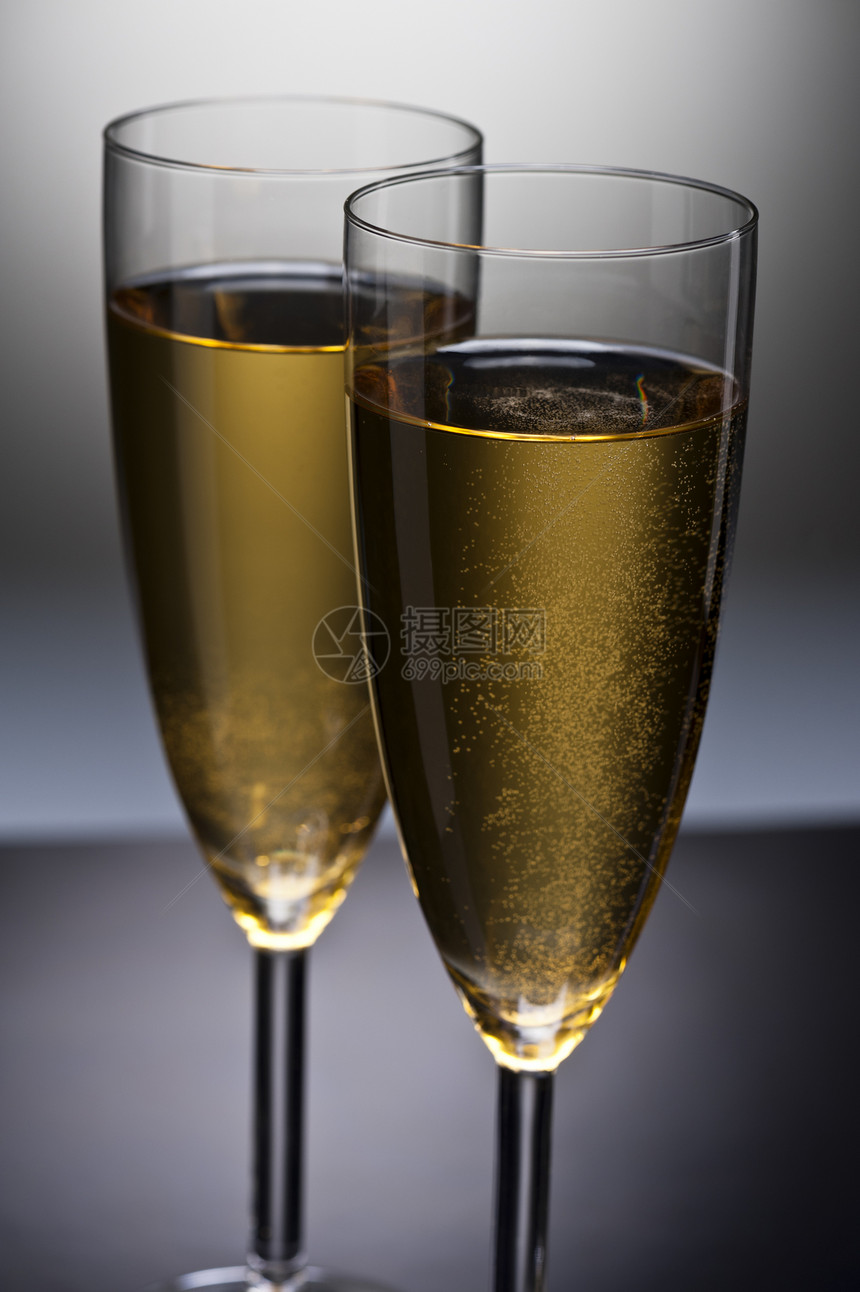 香槟杯魅力饮料派对气泡酒精金子香槟火花反射白酒图片