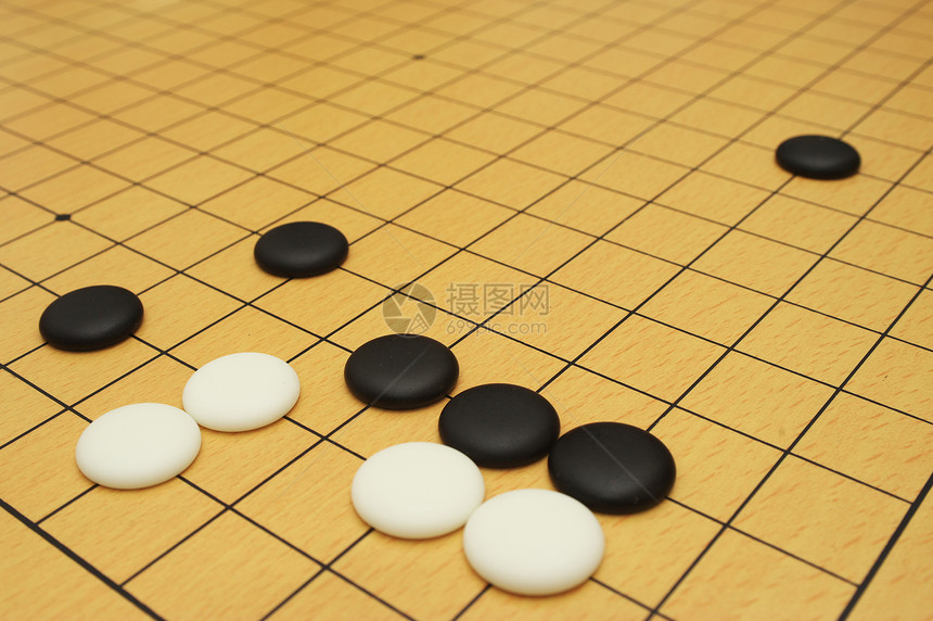 围棋封锁石头玩家战略乐趣黑色哲学智慧游戏球员图片