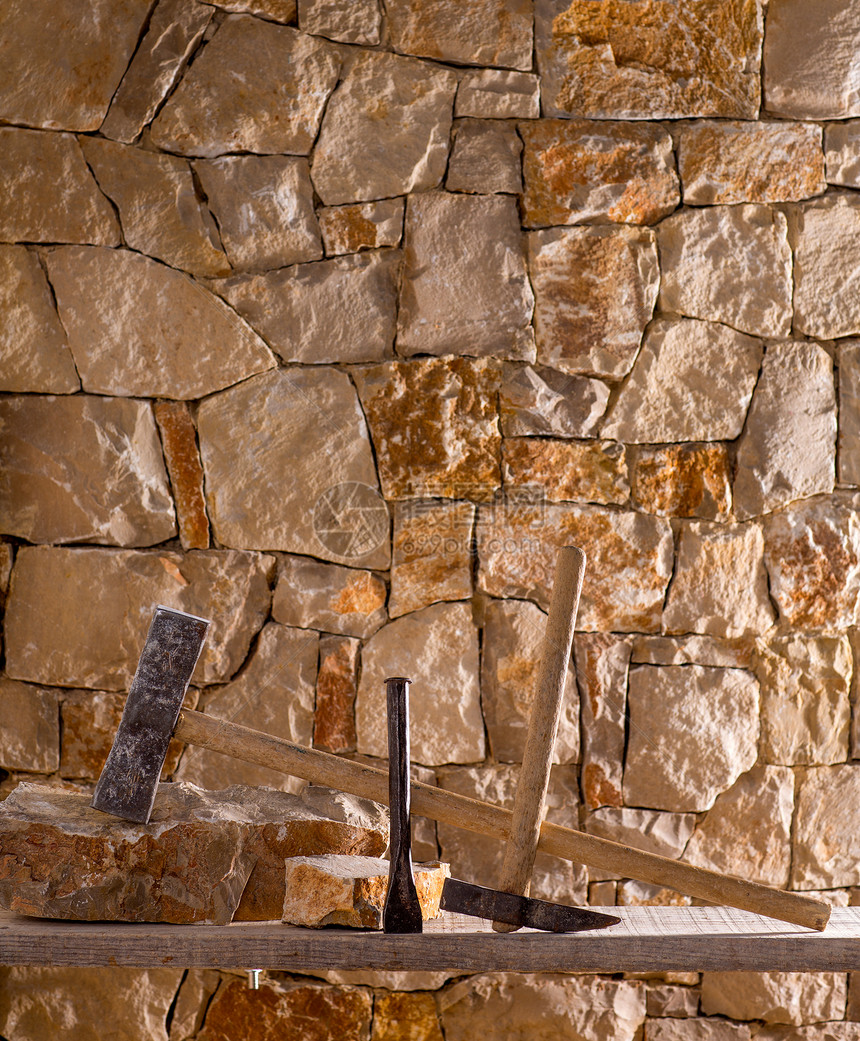 石匠泥瓦工的锤子工具材料壁垒装饰风化风格石工建筑岩石建筑学房子图片