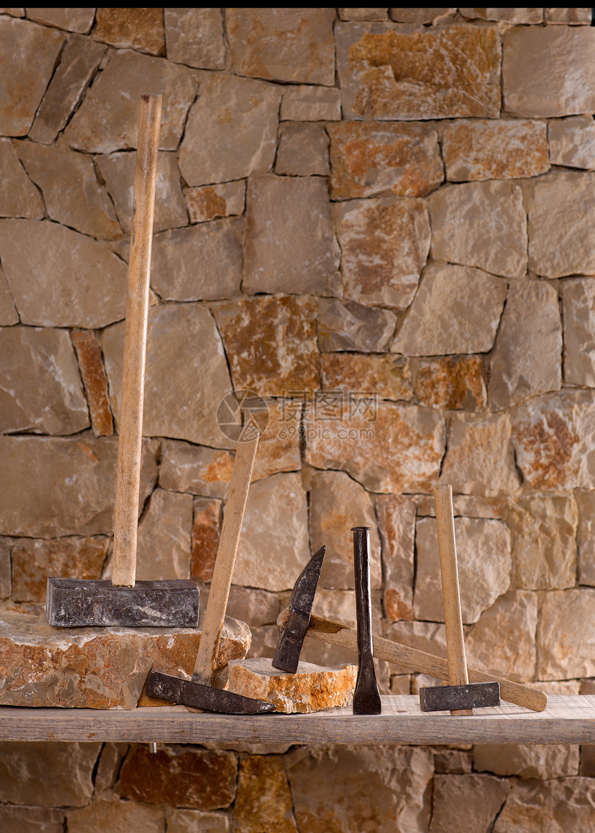 石匠泥瓦工的锤子工具建筑学工作材料岛屿风化石工石头石方建造风格图片