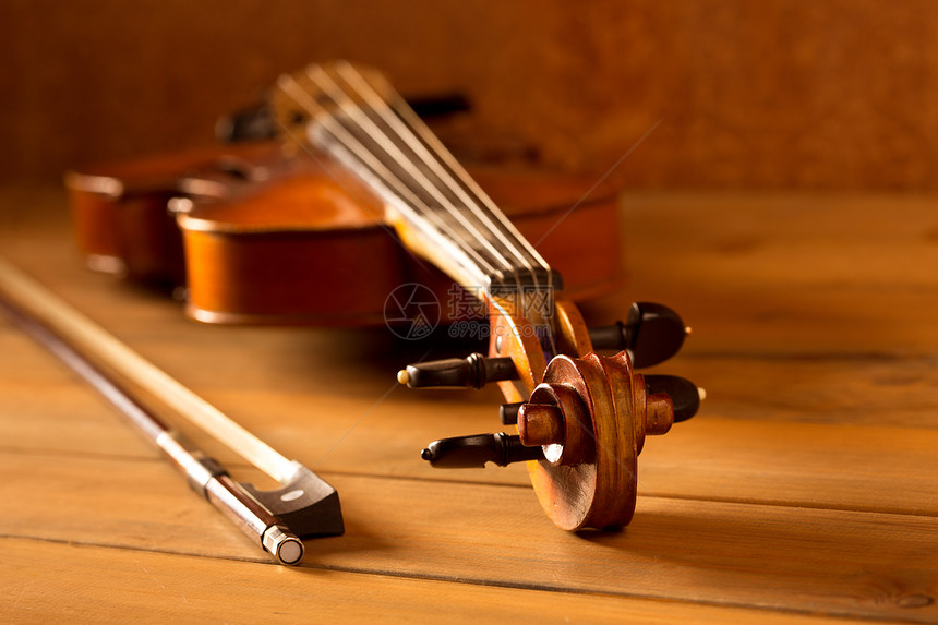 木木背景的经典音乐小提琴古老风格音乐会中提琴大提琴乐器艺术音乐家旋律笔记古董图片