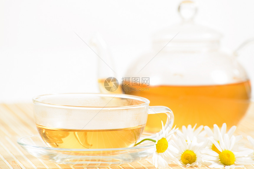 茶杯加香草甘菊茶草本植物时间保健雏菊温泉药品芳香早餐杯子叶子图片