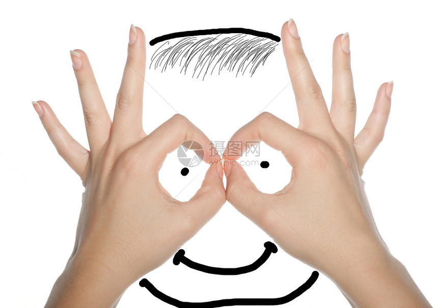 人类的面孔由双手 概念拼凑而成图片