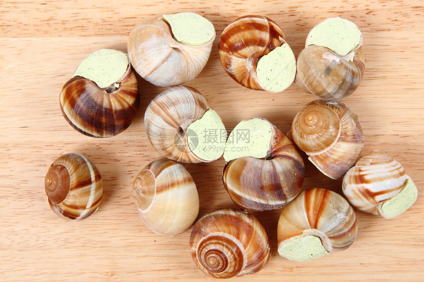 蜗牛如美味的法国美食背景软体香菜食物厨师绿色香料厨房烹饪午餐花园图片