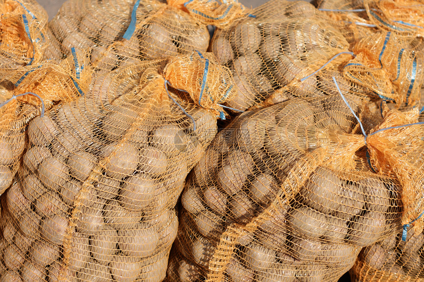 马铃薯背景蔬菜市场鱼种块茎土豆烹饪淀粉生产收成麻布图片