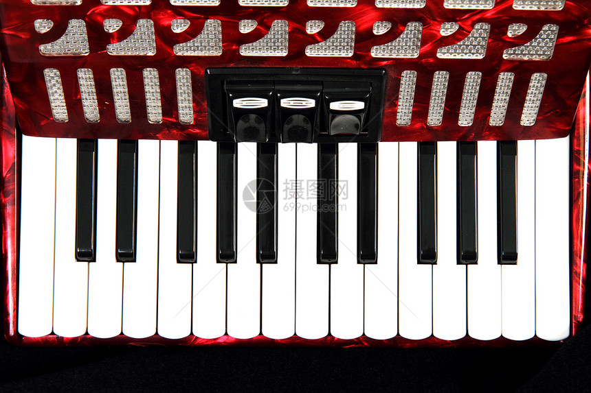 红圆锥形手风琴键盘古董白色红色乐器扬声器音乐黑色图片