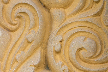 泰国风格雕刻石膏艺术品植物装饰品古董浮雕装饰叶子传统背景图片
