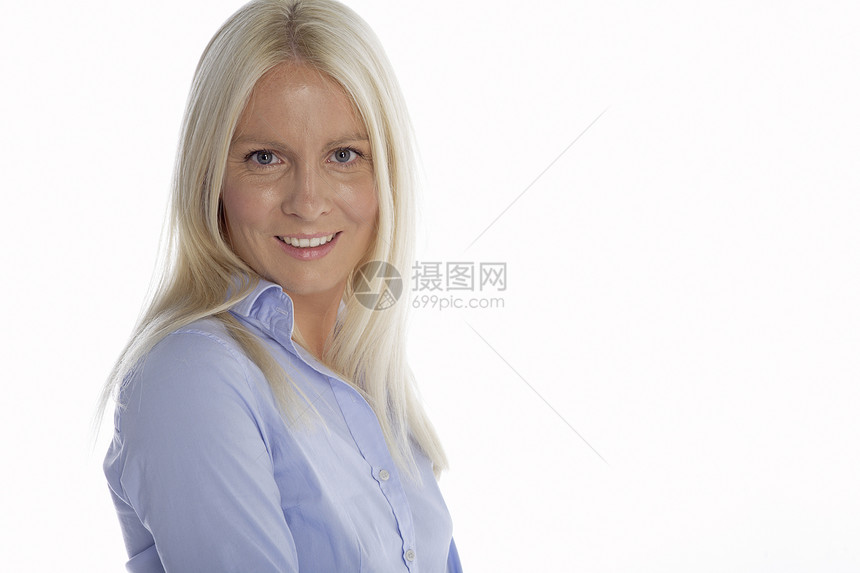 穿蓝衬衫的年轻妇女蓝色衬衫商业公司女孩微笑工作女性女士金发女郎图片
