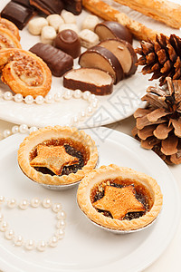 圣诞节甜点水果文化照片香料锥体丝带星形食物巧克力馅饼背景图片