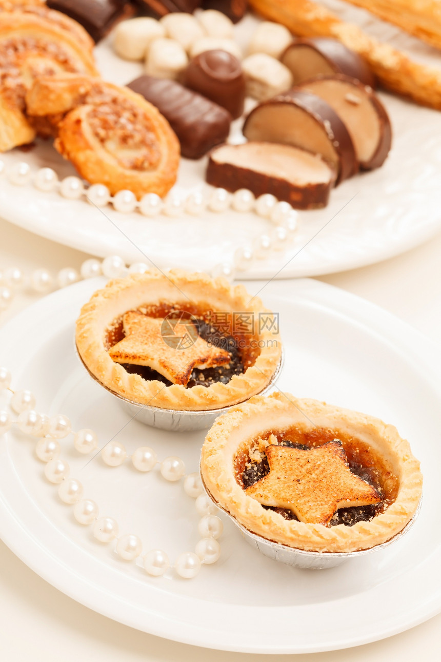 圣诞节甜点锥体食物馅饼巧克力香料丝带金子文化星形水果图片