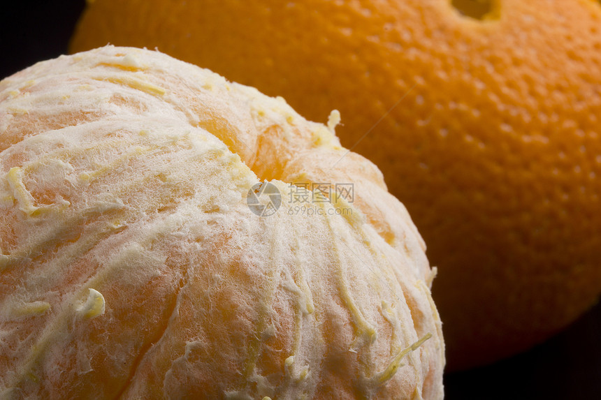 橙片食物水果橙子宏观工作室黑色圆形活力饮食果汁图片